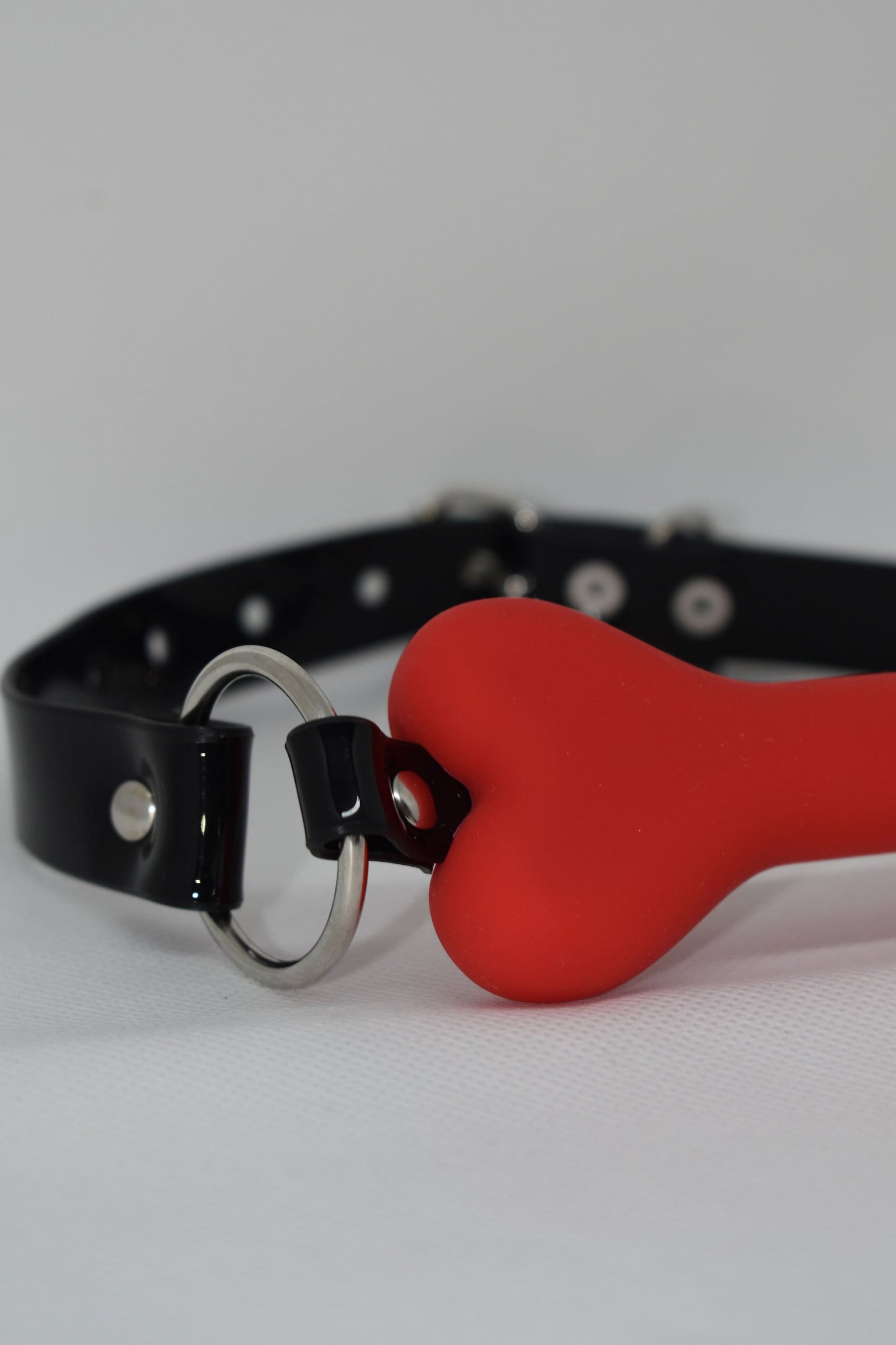 Red bone gag with PVC strap -Lockable -Vegan