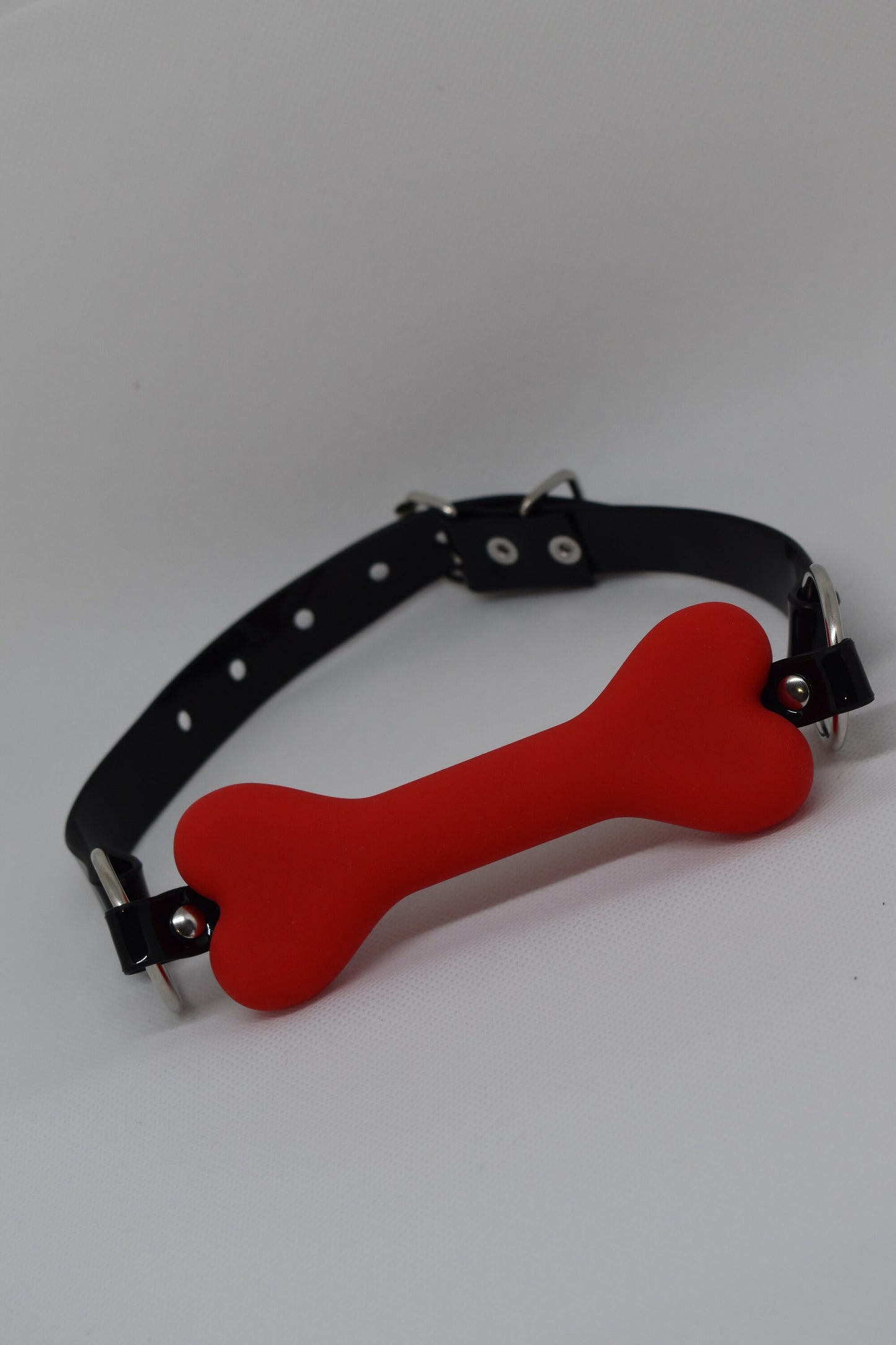 Red bone gag with PVC strap -Lockable -Vegan