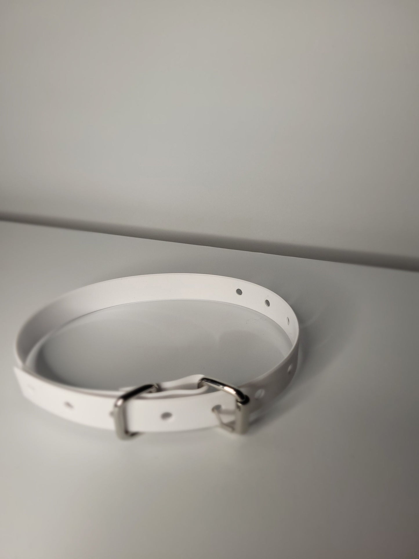 Thin  bondage belt in white PVC