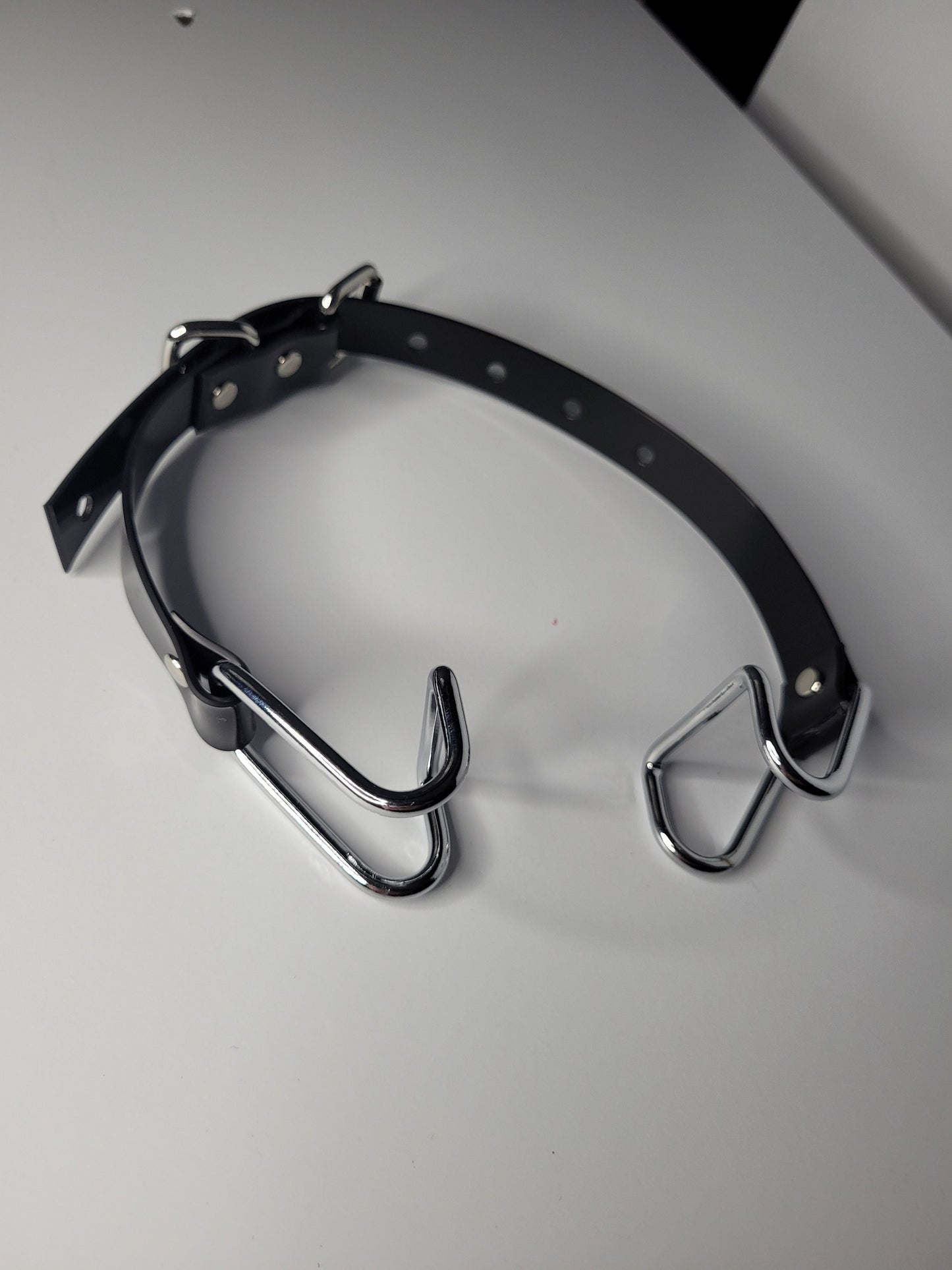 Mouth spreader with PVC strap