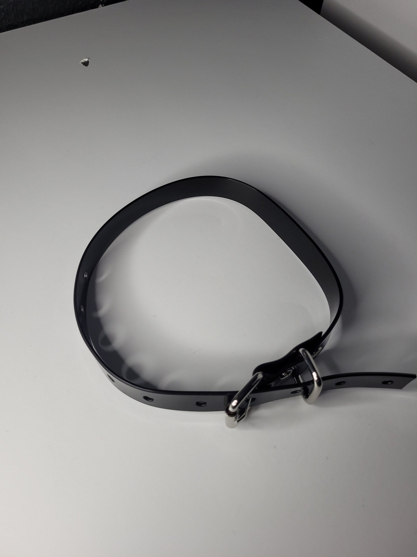 Thin  bondage belt in black PVC