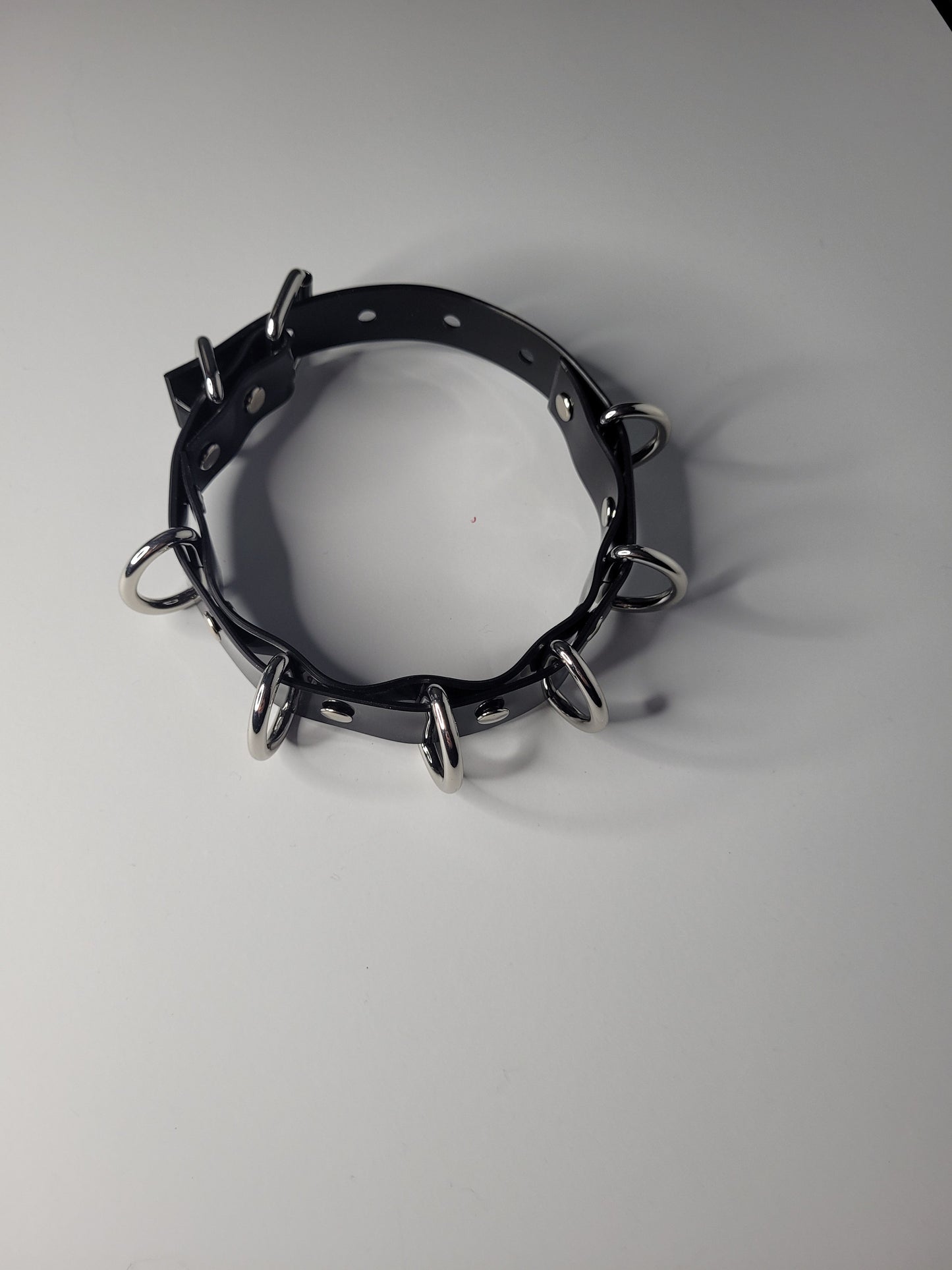 Black PVC neck collar multiple D ring inspired by Rhea Ripley