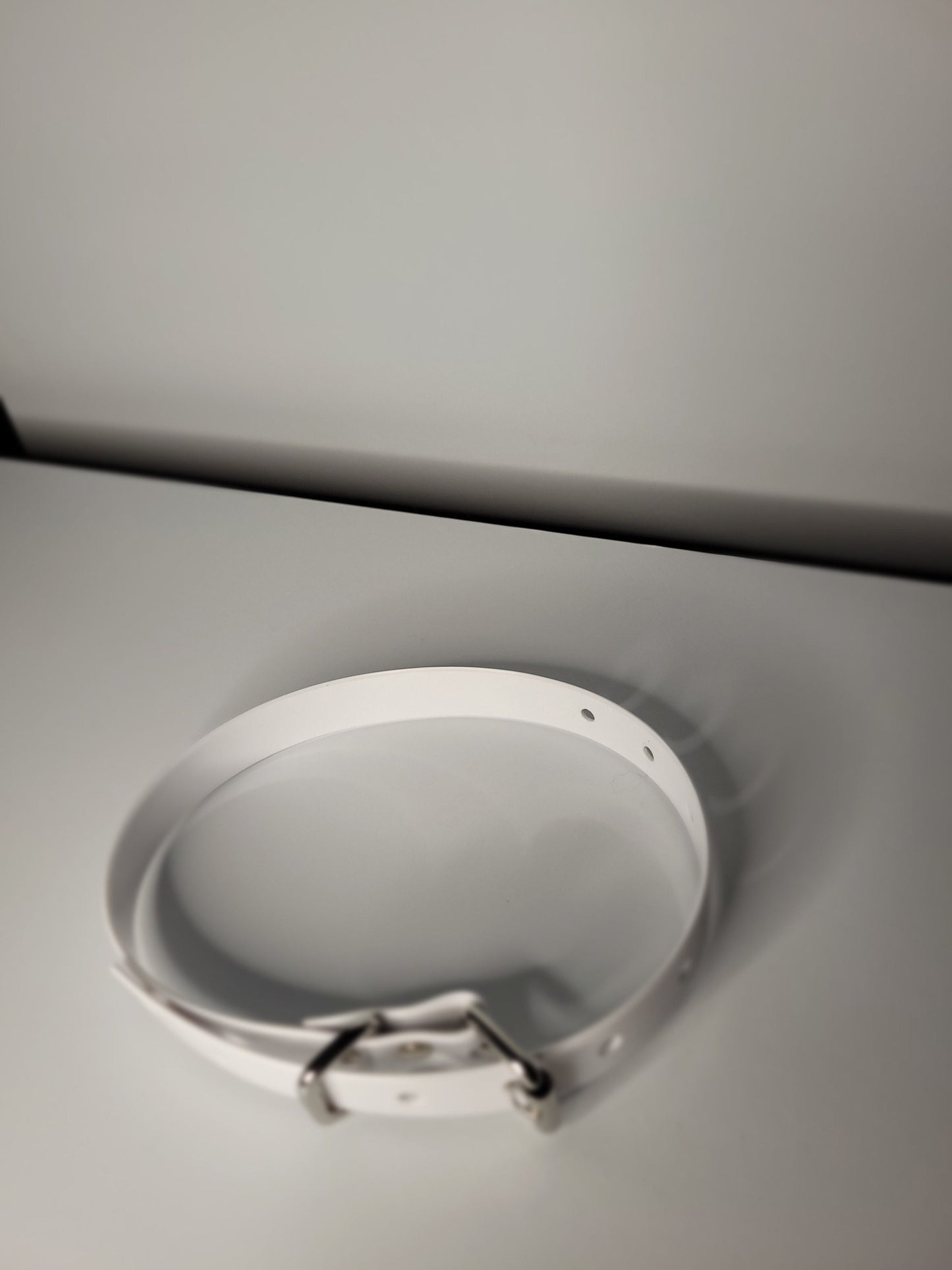 Thin  bondage belt in white PVC