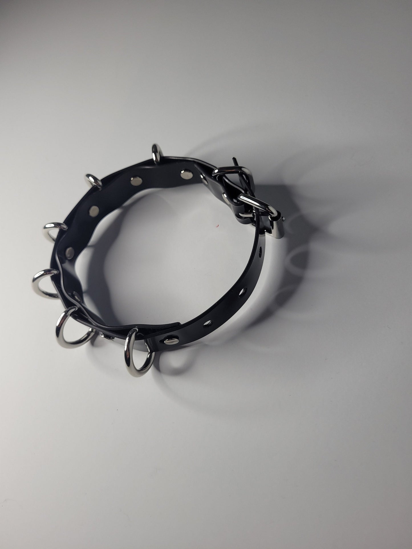 Black PVC neck collar multiple D ring inspired by Rhea Ripley
