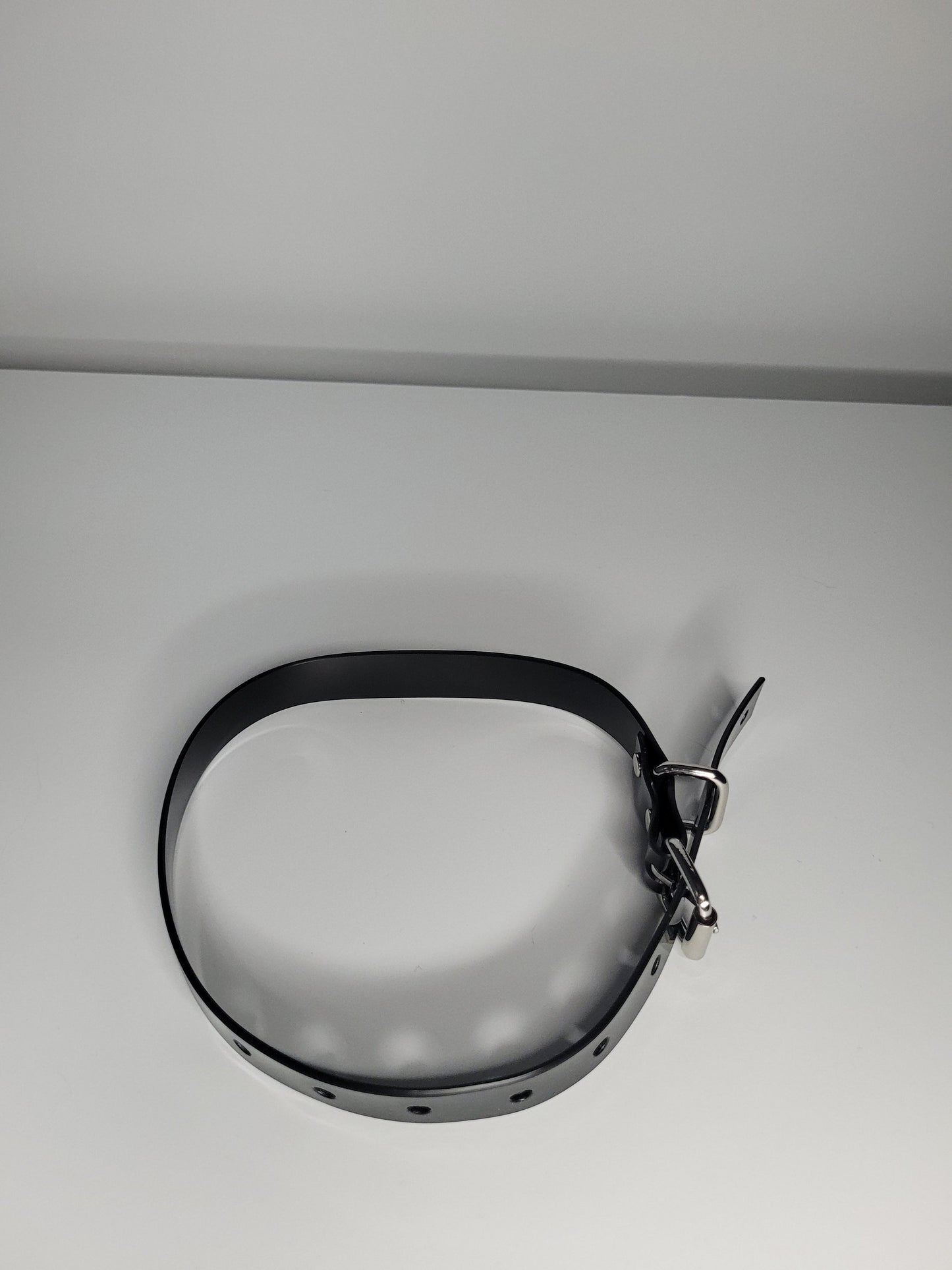 Thin  bondage belt in black PVC