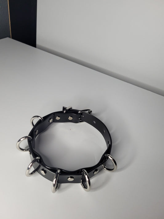 Black PVC neck collar multiple D ring inspired by Rhea Ripley